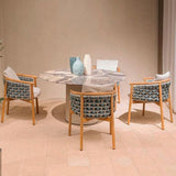 Moderner Outdoor-Esstisch mit Steintischplatte in Schwarz/Grau, oval/rund