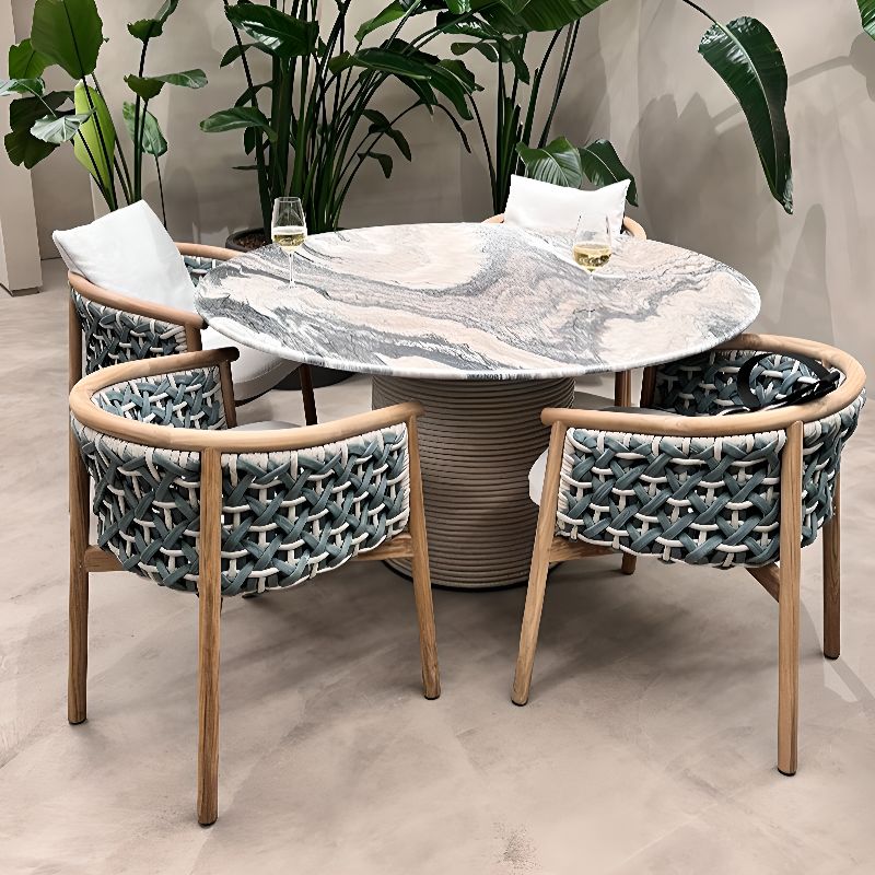 Moderner Outdoor-Esstisch mit Steintischplatte in Schwarz/Grau, oval/rund