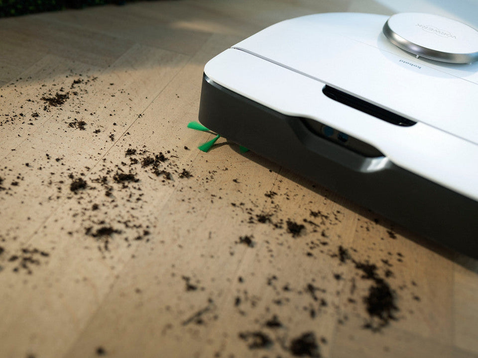 Saugroboter mit Absaugstation