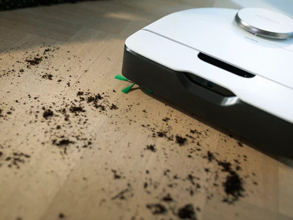 Saugroboter mit Absaugstation