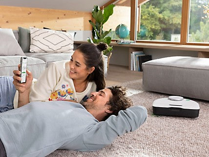 Saugroboter mit Absaugstation